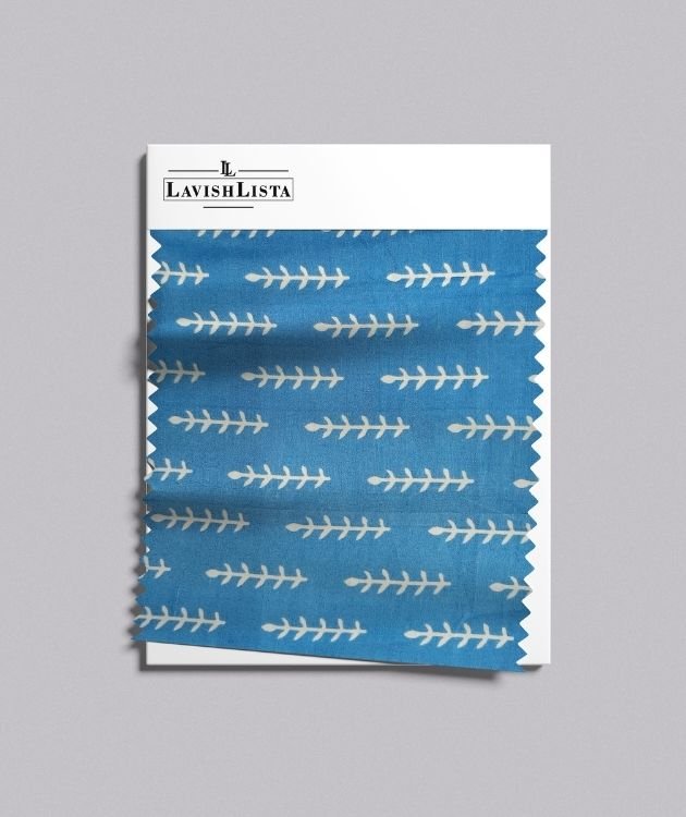 Blue cotton blend fabric with white leaf print