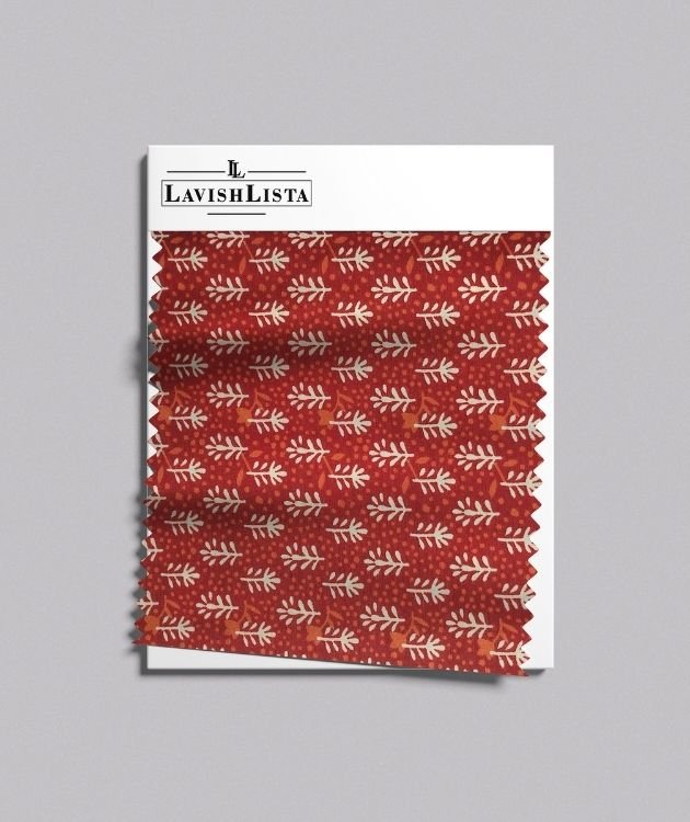 Brown cotton blend fabric with small white leaf motifs.