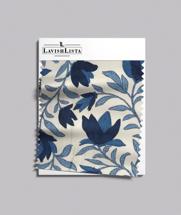 Cream cotton blend fabric with vibrant blue floral print