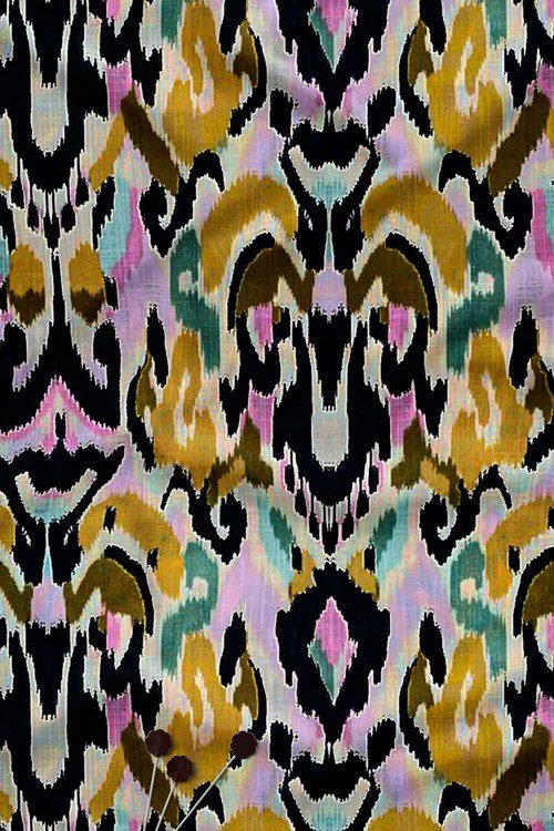 Contemporary abstract ikat inspired digital print fabric on black base