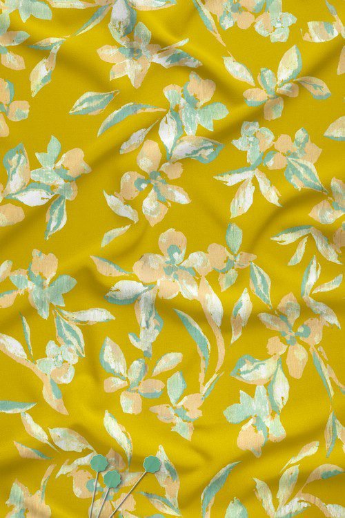 Contemporary painterly floral digital print fabric on mustard yellow base