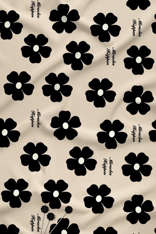 Black daisy floral digital print fabric on beige background
