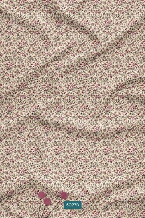 Small scattered mini floral print fabric on light neutral background