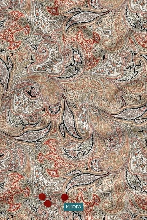 Beige rust paisley printed ethnic fabric