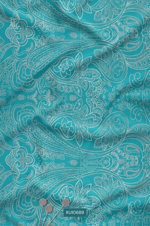 Contemporary paisley digital printed fabric with aqua base and fine line detailing