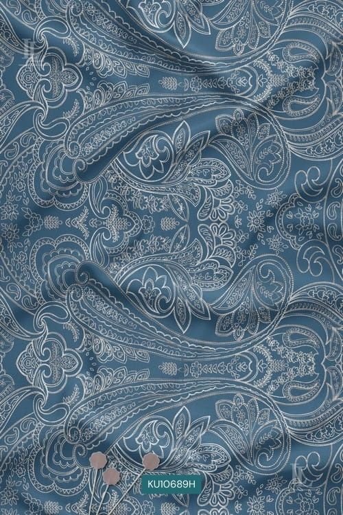 Blue traditional paisley digital print fabric with intricate white detailing