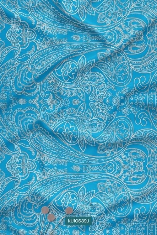 Turquoise fabric with white intricate paisley digital print design