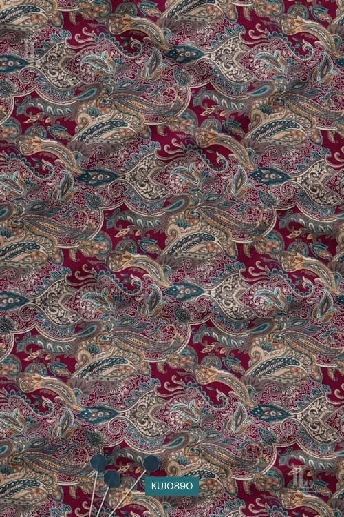 Royal heritage paisley digital printed fabric with intricate teal and cream motifs