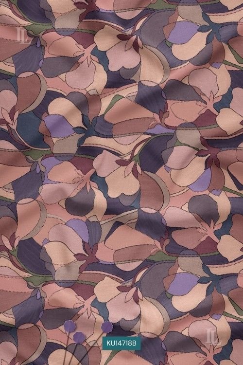 Muted multicolor abstract floral printed fabric with overlapping stylized blossom motifs