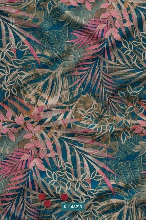 Teal tropical leaf printed fabric featuring artistic botanical foliage design