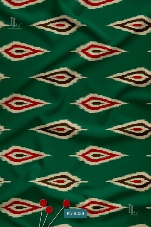 Green fabric with ikat-style diamond geometric digital print pattern