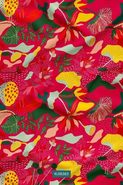 Red fabric with bold multicolor tropical floral and leaf print