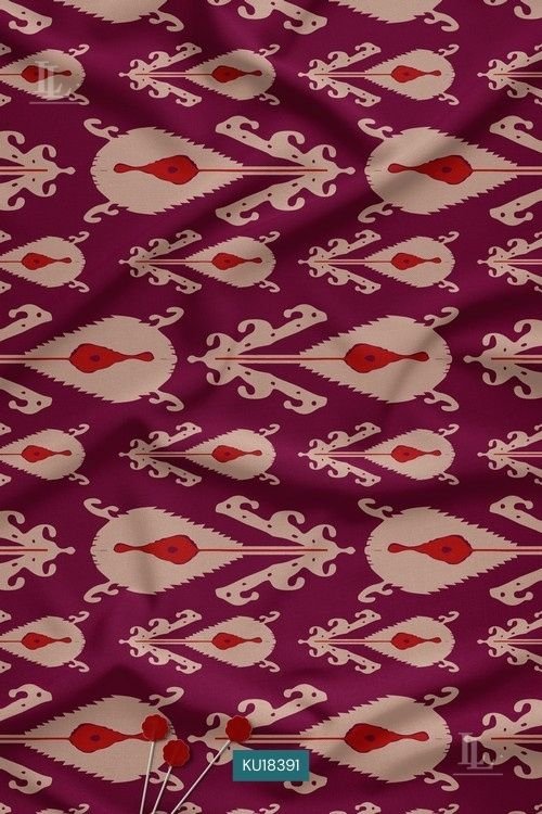 Cream and red Ikat motifs on a deep plum purple fabric background