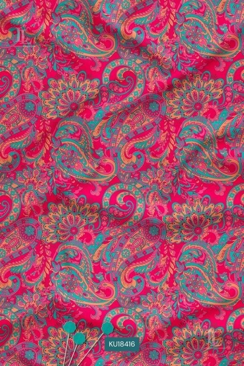 Rani pink fabric with intricate teal paisley and ethnic motifs