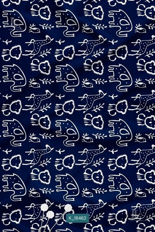 Indigo blue fabric with white folk-style animal and nature motifs