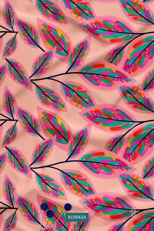 Beige fabric with vibrant multicolor leaf print pattern